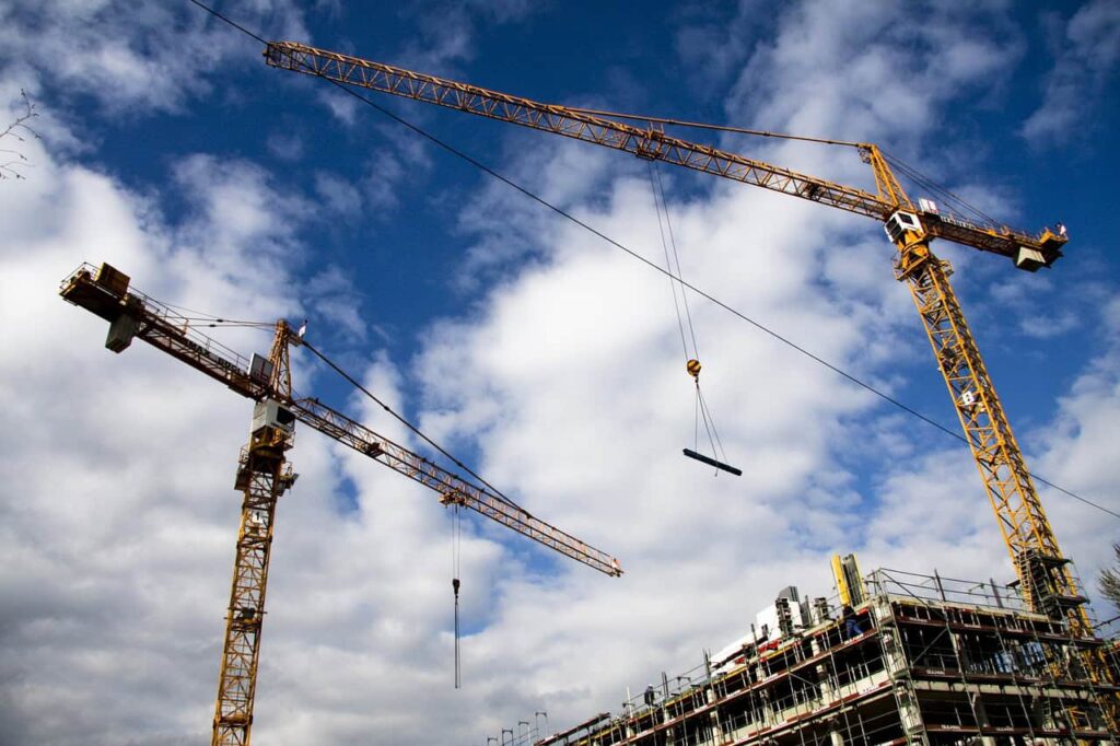 Stockbild inom infrastruktur: construction site, crane, construction machinery