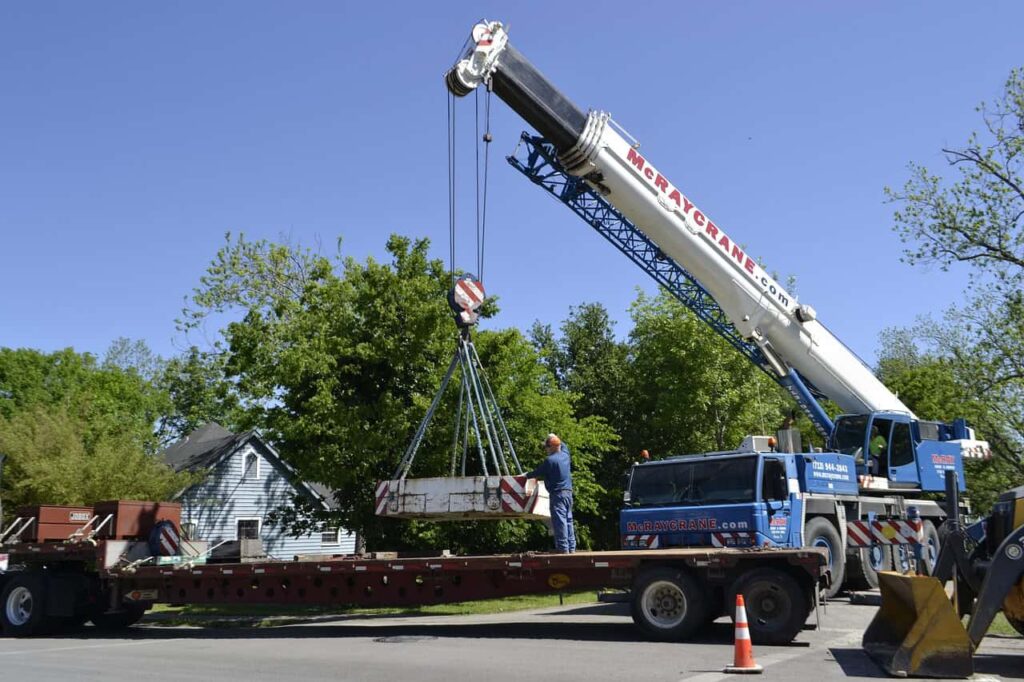 Stockbild inom ny på jobbet: crane, machine, tractor